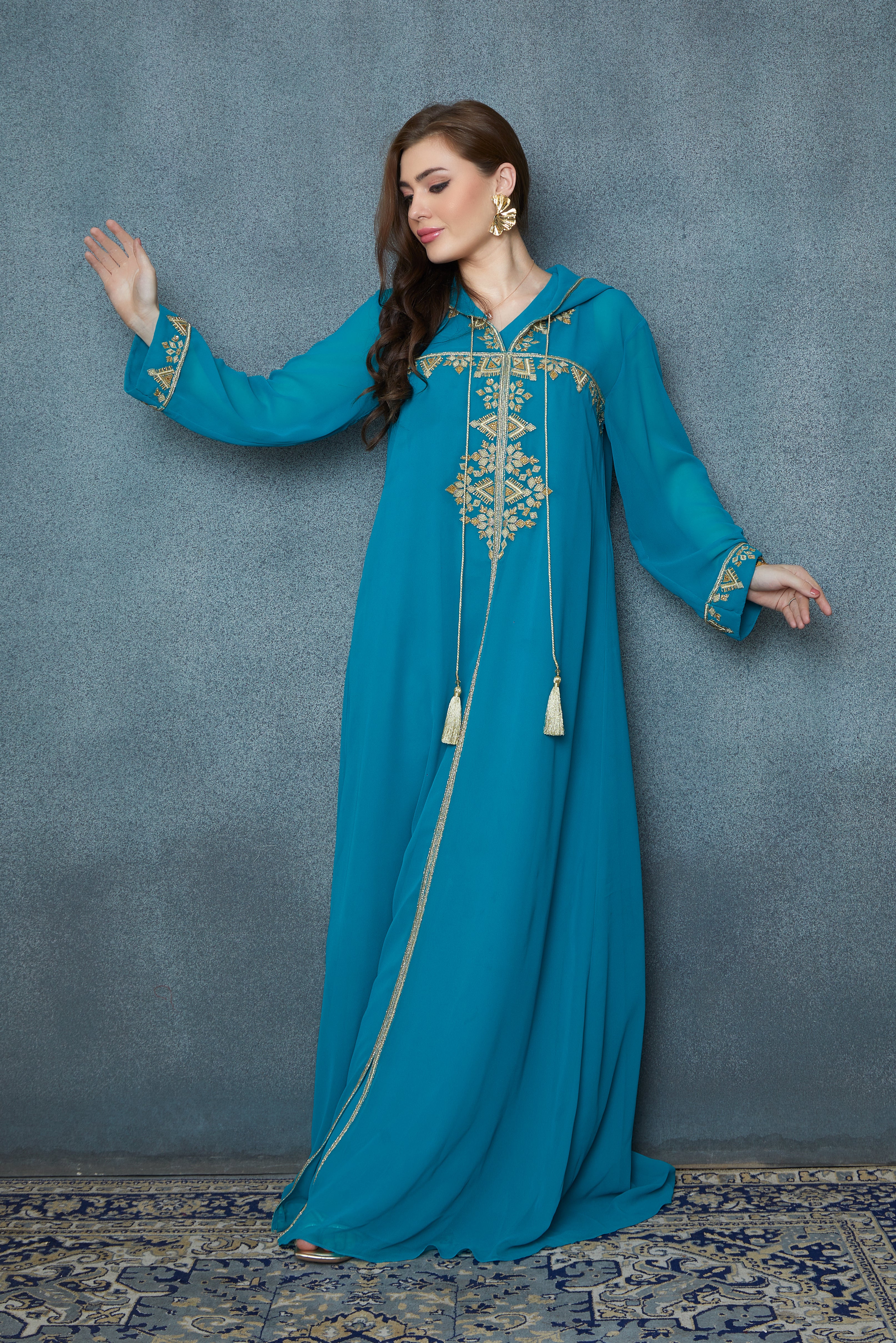 Blue Georgette Kaftan With a Cape and Gold Zari work Highlighted by Hand