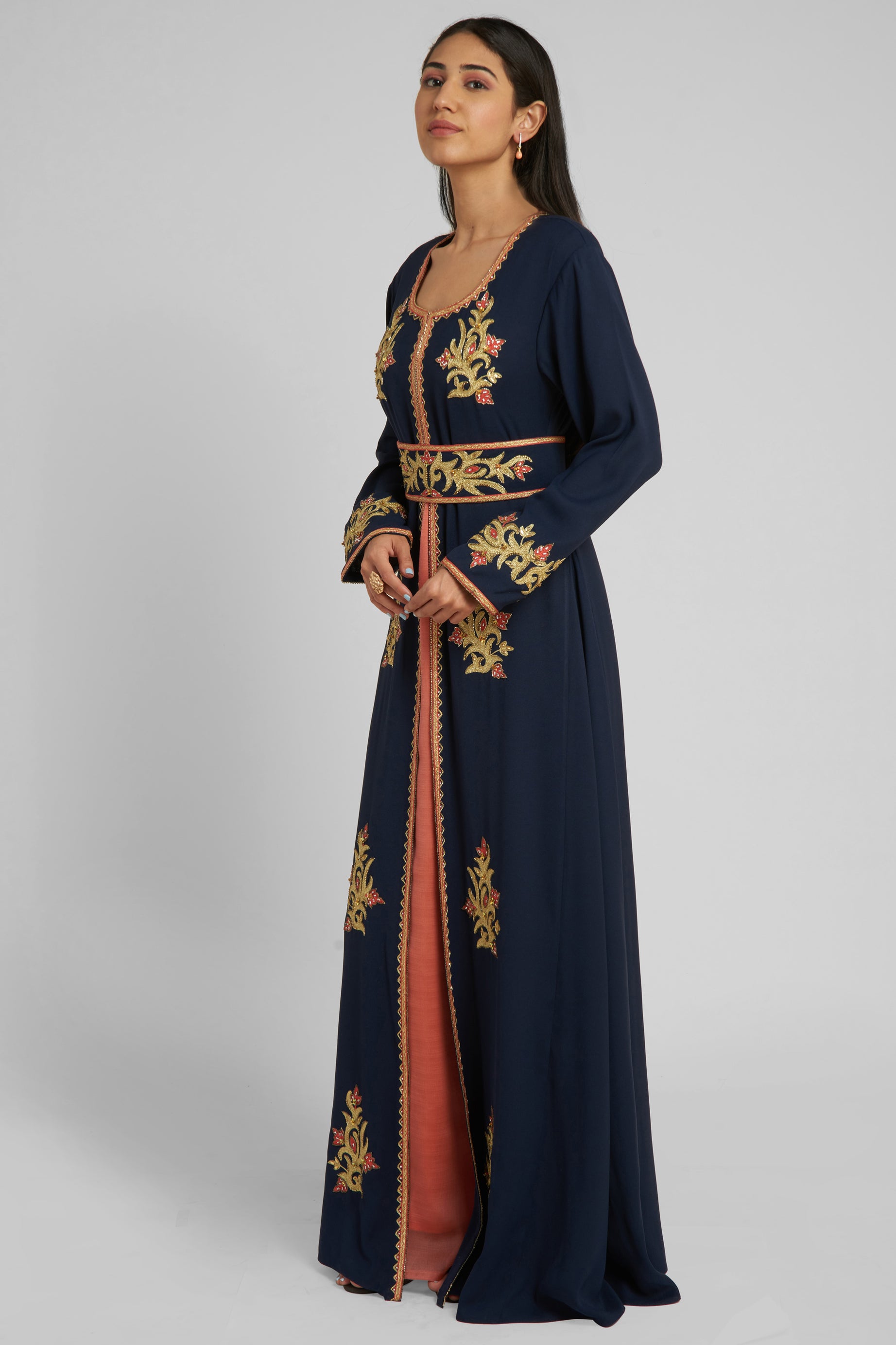 Jalabiya dress in Navy Blue with Golden thread and crystal embroidery .